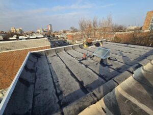 Flat Roof Restoration Philadelphia, PA | Modified Bitumen Roofing & Skylight Installation